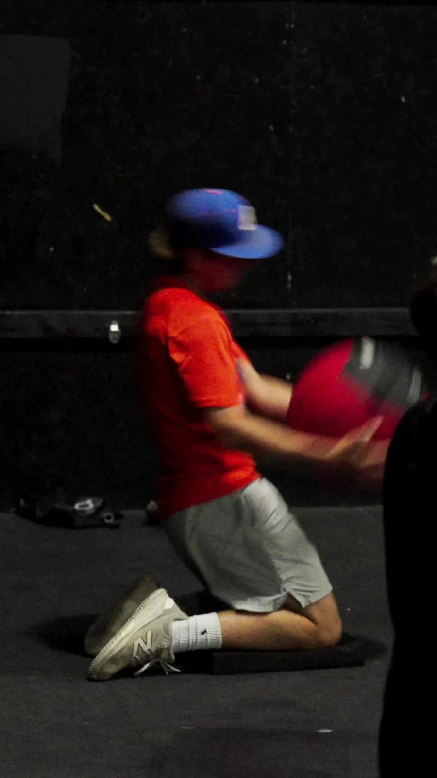 Athlete throwing a medicine ball